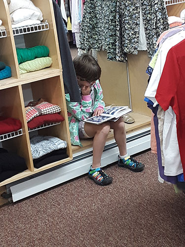 Young customer reading at the TurnStyle